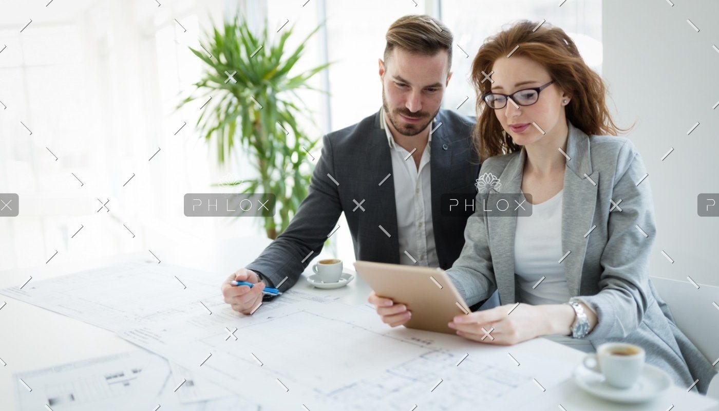 demo-attachment-818-portrait-of-young-architect-woman-on-meeting-KFZCE3A